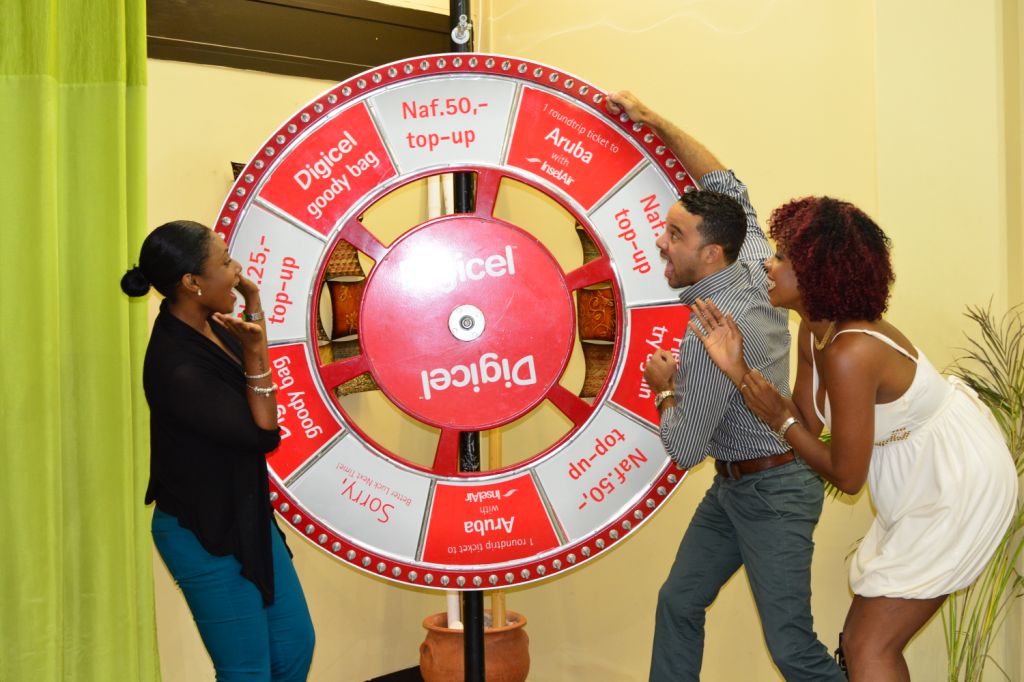 “Spin the Wheel” ku Digicel den programa di televishon New Day